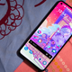 A photo of a phone with the Microsoft Launcher app on it
